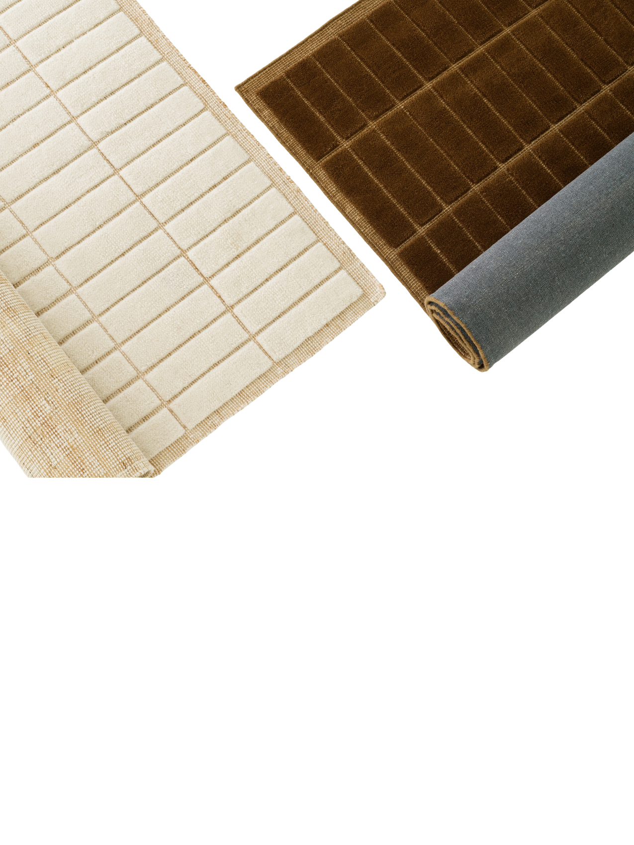 A cream rug and a brown rug, both with a tactile grid pattern. The rugs are rolled back, revealing their different backings.