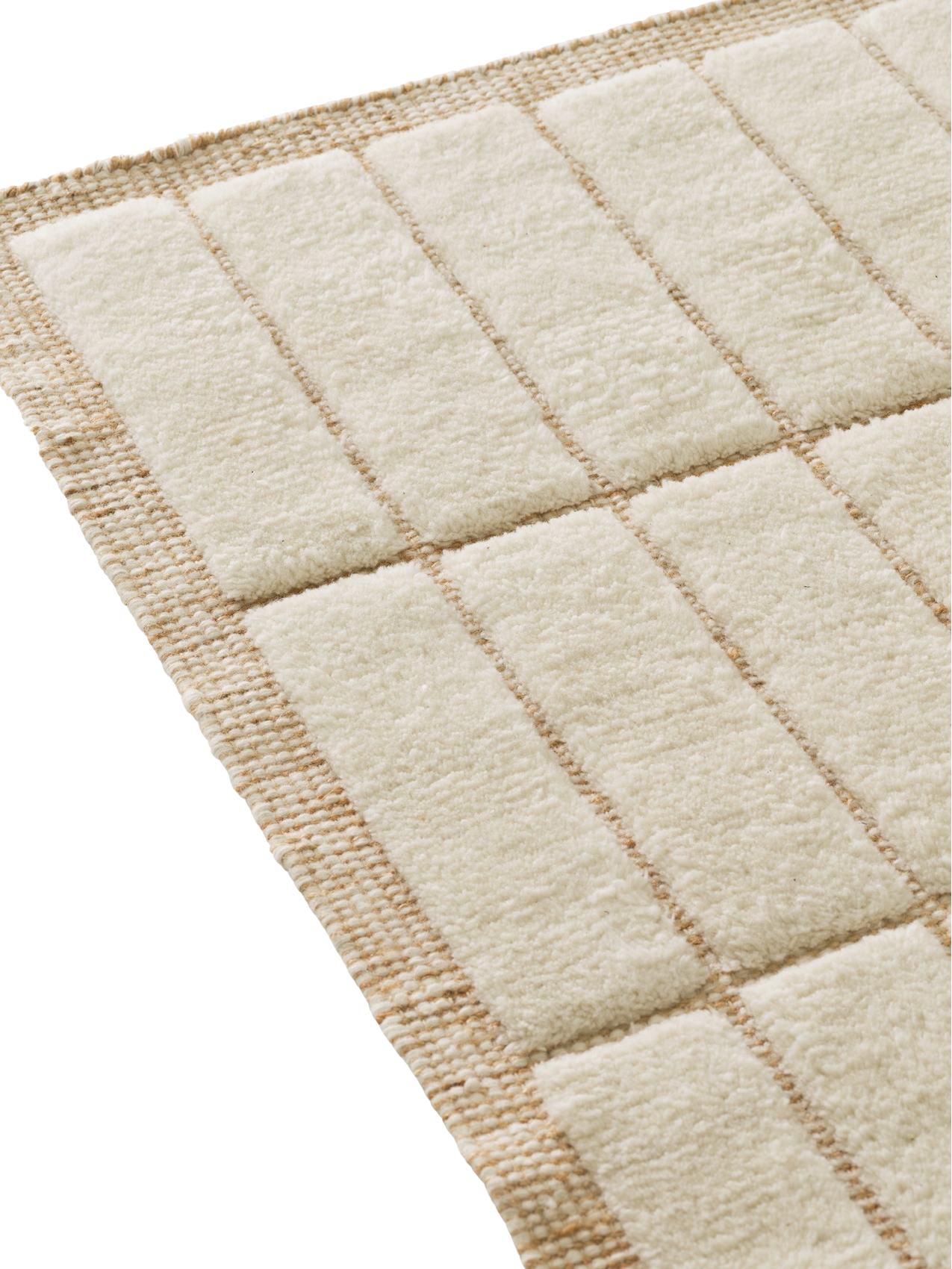 A close-up image showing the texture of a rug with a grid pattern of soft, cream-coloured pile and a flat, beige weave.
