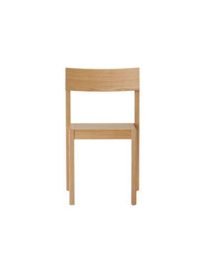 Natural oak Mauro Dining Chair with a veneer seat and minimalist solid wood frame, viewed from the front.
