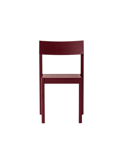 Mauro Dining Chair in French red oak, featuring a curved veneer seat and backrest on a solid wood frame.