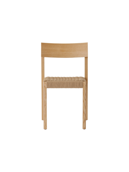 Mauro Dining Chair in natural oak with a handwoven papercord seat, showcasing a clean and minimalist Danish design.