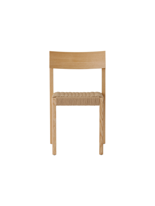 Mauro Dining Chair in natural oak with a handwoven papercord seat, showcasing a clean and minimalist Danish design.
