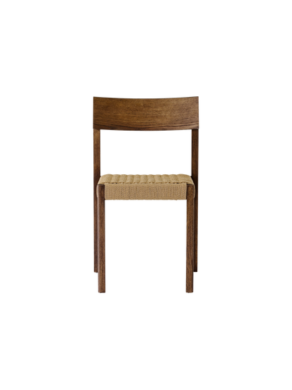 Mauro Dining Chair in dark-stained oak with a handwoven natural papercord seat, shown from the front.