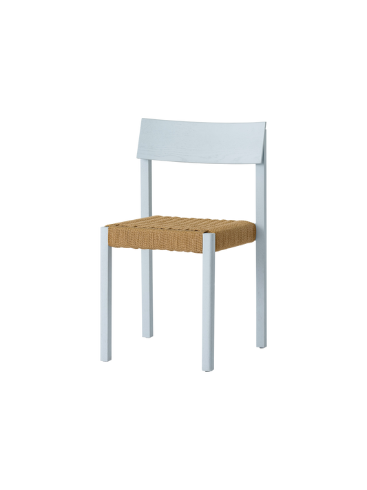Mauro Dining Chair in linen blue stained oak with a natural handwoven paper cord seat, shown at an angle.