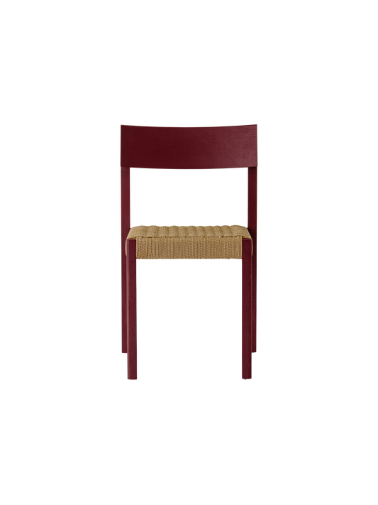 Mauro Dining Chair in French red oak with a handwoven paper cord seat, shown in a straight-on front view.