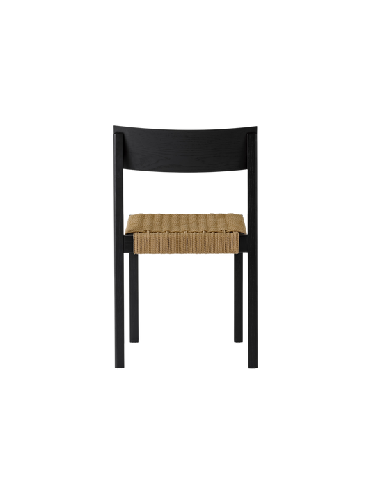 Back view of the black Mauro Dining Chair featuring a solid wood frame and a handwoven natural paper cord seat.