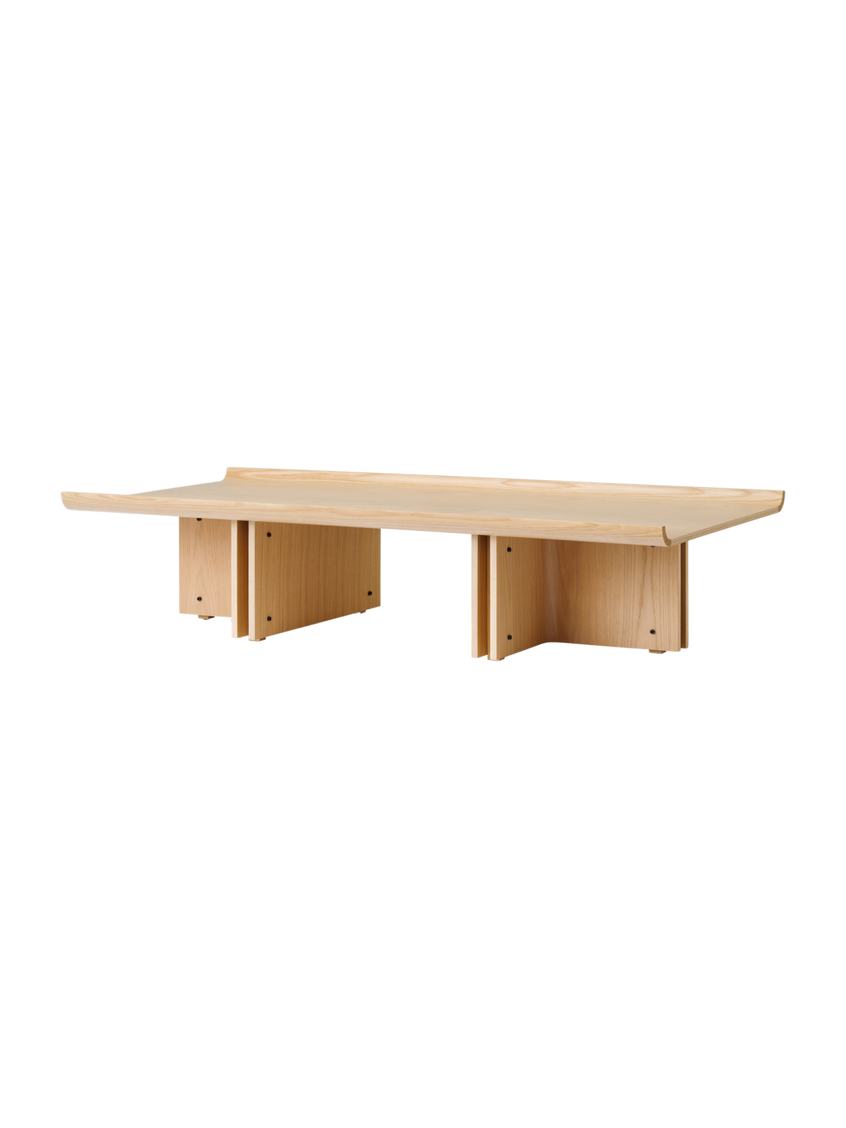 Conrad Lounge Table in natural oak veneer, shown from an angle highlighting its upward-curving edges and solid wood base.