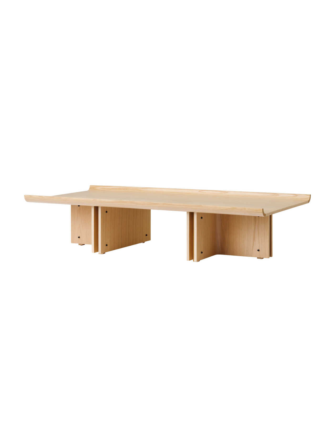 Conrad Lounge Table in natural oak veneer, shown from an angle highlighting its upward-curving edges and solid wood base.