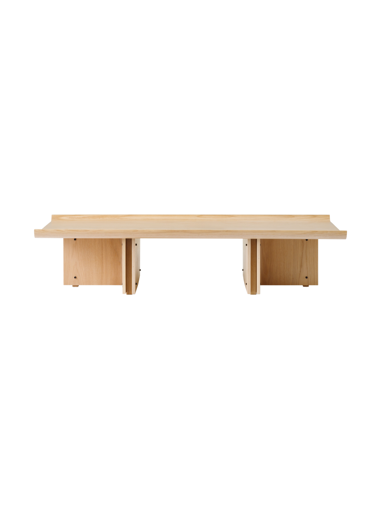 Conrad Lounge Table in natural oak veneer, shown from the front against a black background.
