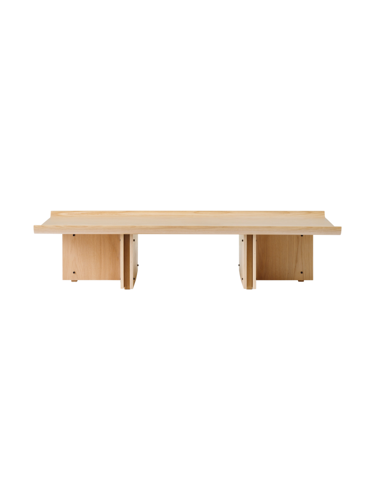 Conrad Lounge Table in natural oak veneer, shown from the front against a black background.
