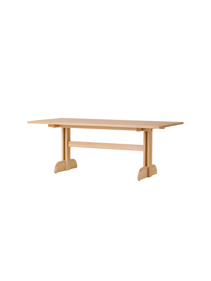 Rectangular Puffin Dining Table in natural oak, featuring a solid oak base and clean, Shaker-inspired design details.