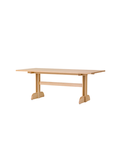 Rectangular Puffin Dining Table in natural solid oak, featuring a Shaker-style wooden base on a plain white background.