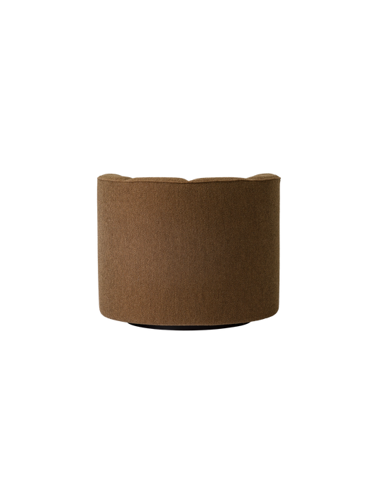 Back view of the Eave Seamline Lounge Chair in Logan Nutmeg fabric, showing its curved, fully upholstered silhouette.