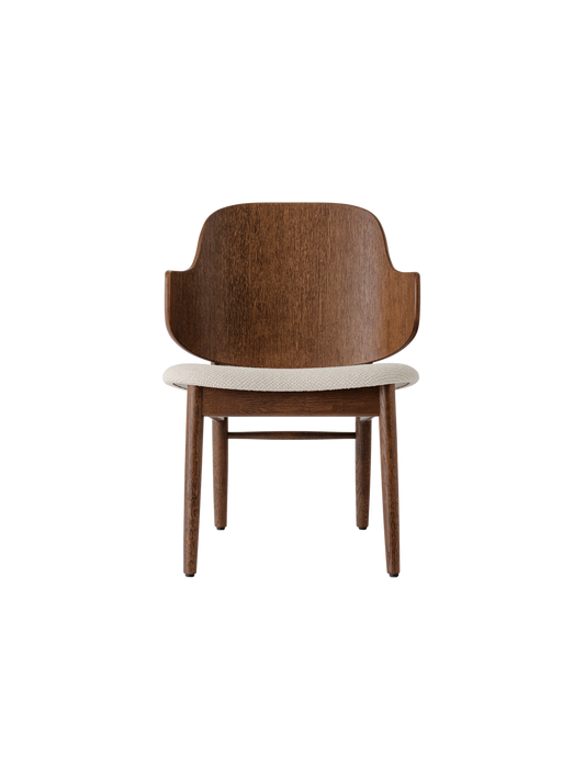 The Penguin Wooden Lounge Chair in red-stained oak with a textured light beige seat, viewed from the front.
