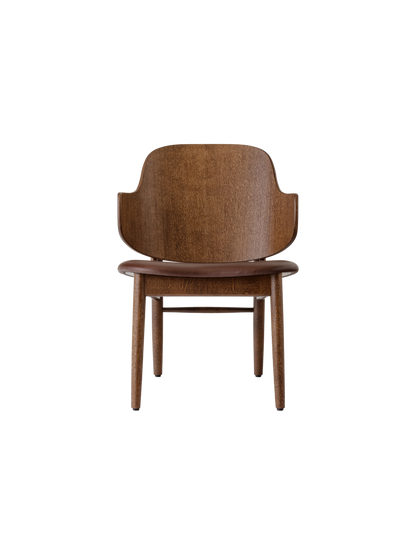 The Penguin Wooden Lounge Chair in red-stained oak with a dark brown upholstered seat, against a white background.