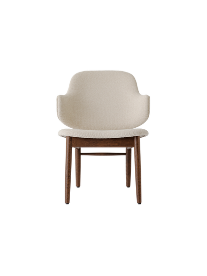 The Penguin Wooden Lounge Chair featuring a dark-stained oak frame and light beige Logan fabric upholstery.