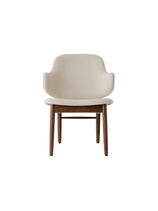 The Penguin Wooden Lounge Chair featuring a dark-stained oak frame and light beige Logan fabric upholstery.
