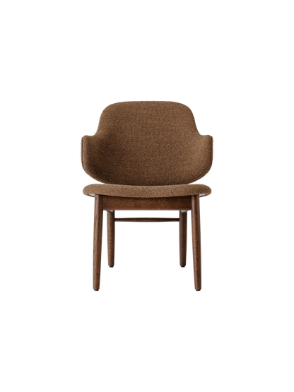 The Penguin Wooden Lounge Chair featuring textured Nutmeg Logan upholstery and a red-stained oak base.