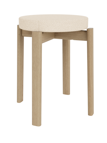 Upholstered Passage Stool in natural oak featuring a textured Logan Jasmine fabric seat, shown from an angled view.