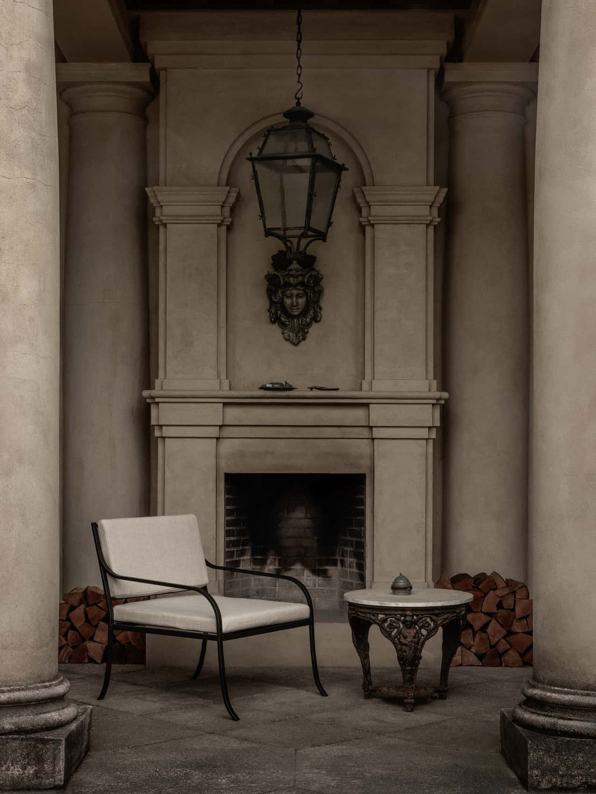 Bloss Garden Lounge Chair with cushion set and black steel frame, shown in an outdoor setting.