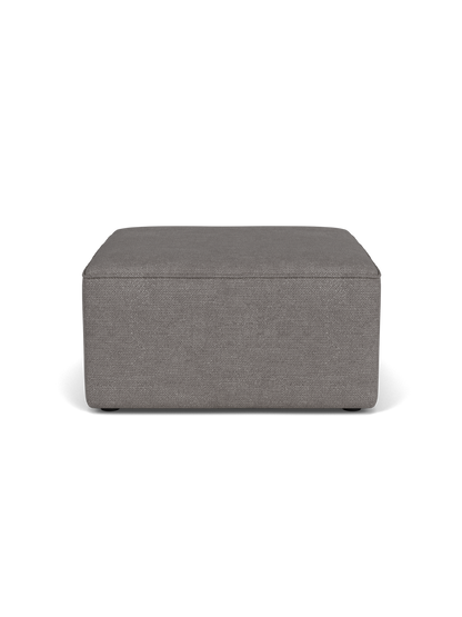 Front view of the square Eave Modular Pouf, 75, showing its piped seam. It is upholstered in grey Audo Bouclé 16 fabric.