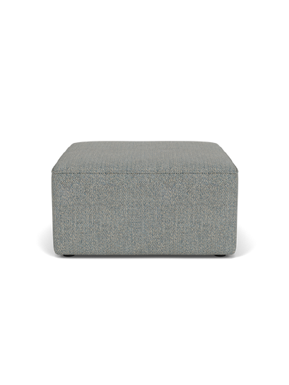 A front view of the Eave Modular Pouf, 75. The square pouf has textured, light blue and grey Safire 012 upholstery.