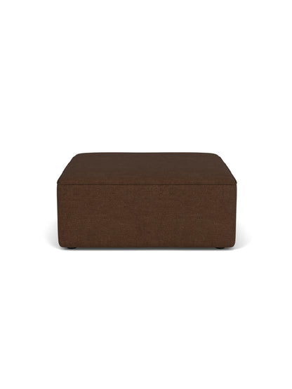 A front-on view of the rectangular Eave Modular Sofa, 96, Pouf, upholstered in a textured brown fabric.