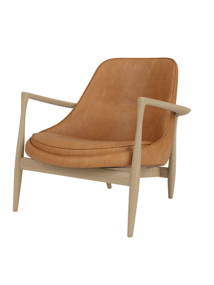 A three-quarter view of the Elizabeth Lounge Chair, featuring a sculpted natural oak frame and cognac leather upholstery.