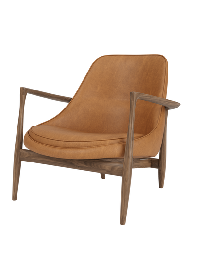 A three-quarters view of the Elizabeth Lounge Chair, featuring a dark walnut frame and cognac-coloured leather upholstery.