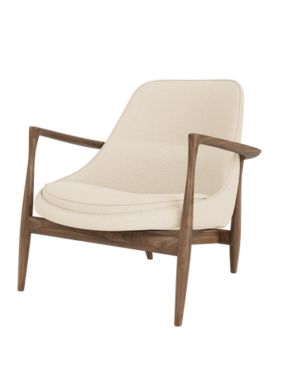 A three-quarter view of the Elizabeth Lounge Chair with walnut frame, sculpted armrests and Logan Jasmine upholstery.