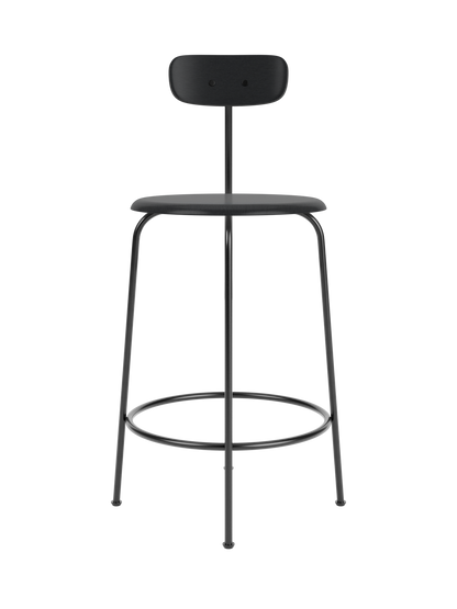 Front view of the Afteroom Counter Chair in black veneer. The chair has a slim metal frame, a round seat, and a low backrest.