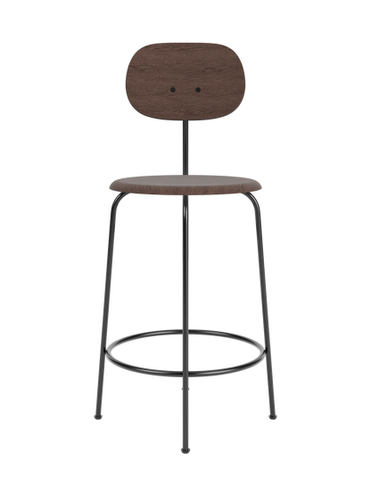 A front-on studio shot of the Afteroom Counter Chair Plus, Veneer in dark stained oak with a black powder-coated steel frame.