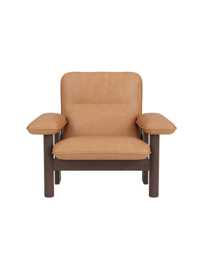 Front-on view of the Brasilia Lounge Chair, High Back, with a dark stained oak frame and plush camel-coloured upholstery.