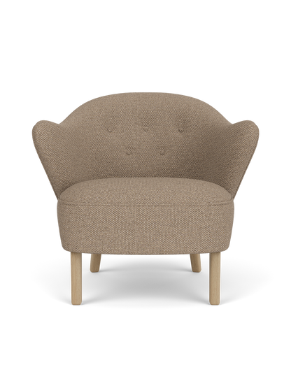 Ingeborg Lounge Chair in Logan Flint textile with natural oak legs, featuring a compact, curved silhouette.