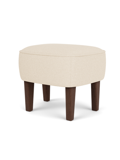 Ingeborg Ottoman upholstered in off-white Logan Jasmine textile with four tapered dark-stained oak legs.