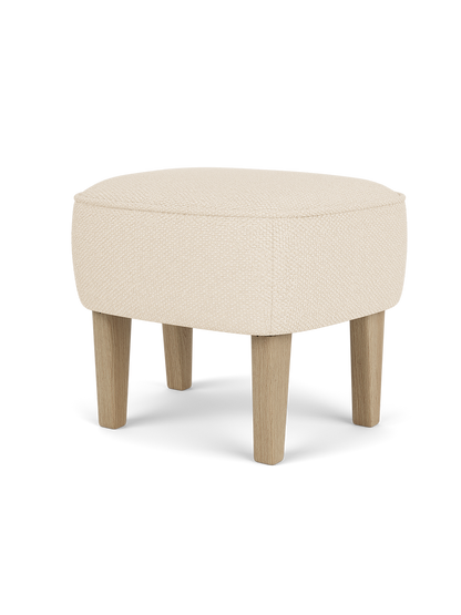 Ingeborg Ottoman in Logan Jasmine textile with natural oak legs, featuring a curved 1940s design by Flemming Lassen.