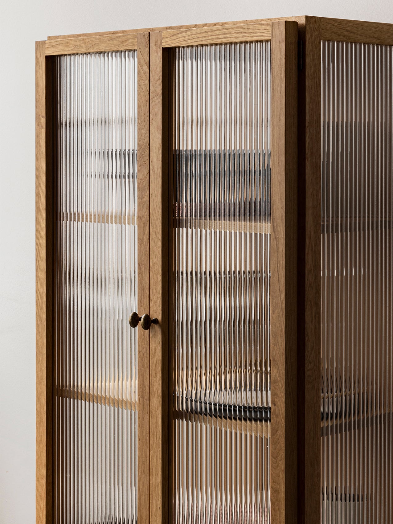 Curiosity Cabinet | Elegant oak cabinet by Mentze Ottenstein