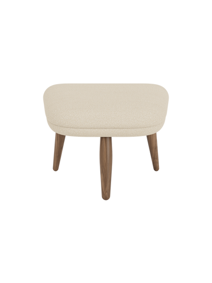 Front view of the Oda Ottoman, with a rectangular cushioned seat in light Hallingdal fabric and four tapered walnut legs.