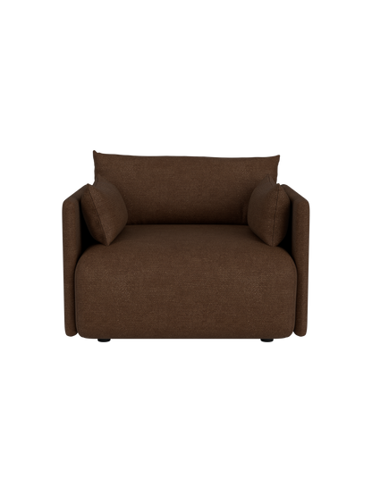 Front view of the Offset Sofa armchair in brown Audo Bouclé 07 fabric. A one-seater sofa has a boxy frame and soft cushions.