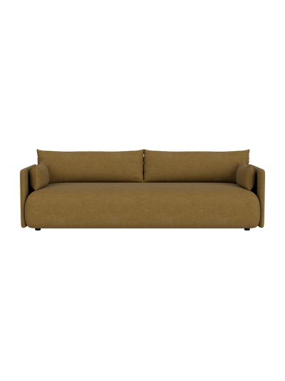 Front view of the modern Offset Sofa, 3-seater version, upholstered in a textured, mustard-yellow Audo Bouclé 06 fabric.
