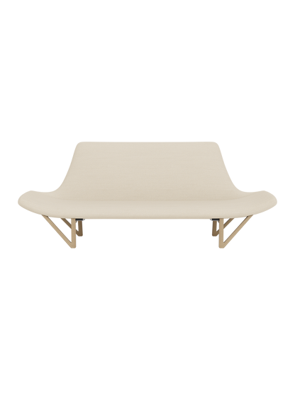 A front-on view of the Pagode Sofa with light cream Hallingdal 200 upholstery and a natural oak frame with V-shaped legs.