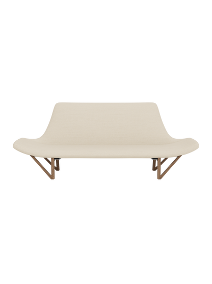 Front view of the Pagode Sofa, upholstered in light cream Hallingdal fabric with a sculptural frame and V-shaped walnut legs.