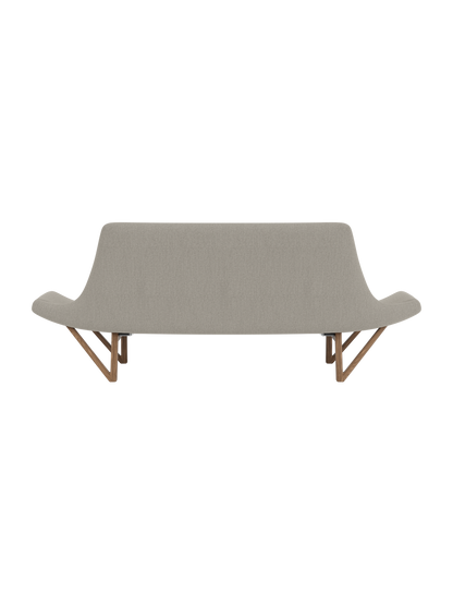 Back view of the Pagode Sofa in light grey Re-Wool upholstery with a walnut frame and V-shaped legs on a black background.