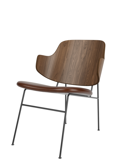 A Penguin Lounge Chair with a curved walnut veneer backrest, a brown upholstered seat, and a slim, black steel frame.