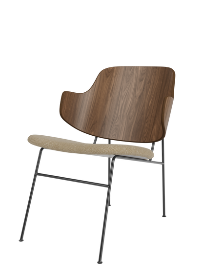 A Penguin Lounge Chair with a curved walnut veneer back and an Audo Bouclé 02 upholstered seat on a slim steel frame.