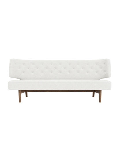 Front view of the Radiohus Sofa P2, featuring off-white button-tufted upholstery and a dark walnut wood frame.