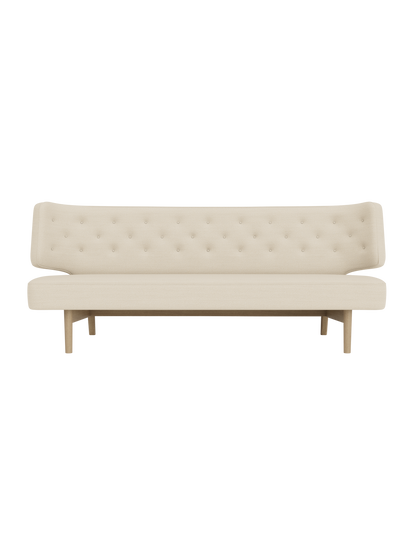Front view of the Radiohus Sofa P2, featuring a button-tufted backrest, light Hallingdal upholstery and natural oak legs.