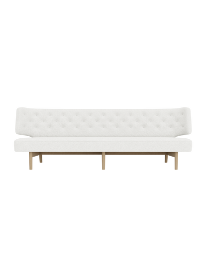 Front view of the Radiohus Sofa P3 in off-white Hallingdal 110 upholstery with a button-tufted back and natural oak legs.