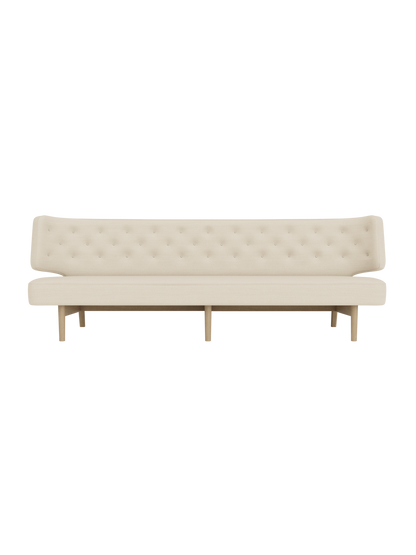 A front view of the Radiohus Sofa P3, featuring light cream upholstery with a button-tufted backrest on a natural oak frame.