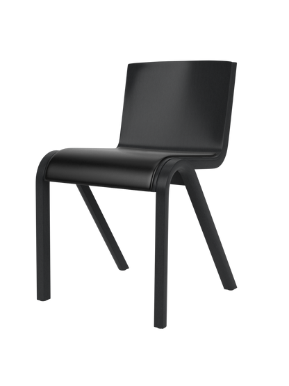 A three-quarter view of the Ready Dining Chair. It has a black painted oak frame and a seat upholstered in dark material.